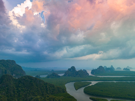 Canals winding in the mangroves create a heart-shaped island.
Aerial drone view Imagine the beautiful cloudy above heart shaped island.
beautiful rain cloud in sunset background.の写真素材