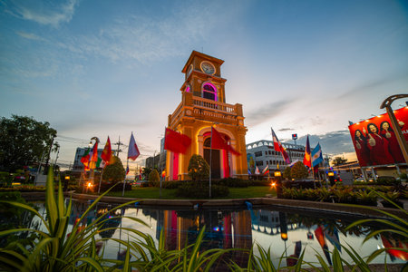 Phuket-Thailand, 13 August 2025: The colonial-style clock tower rises gracefully against a dramatic...