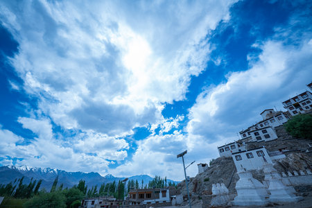 Ladakh,India-May,23,2025: Tibetan prayer stones and view on Thiksay monastery, Ladakh, one of more interesting objects in the Indus valley in Leh District, Indiaの写真素材