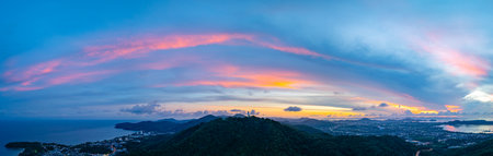 aerial night view beautiful lighting around the Phuket.  Twinkling lights along the beach and in...