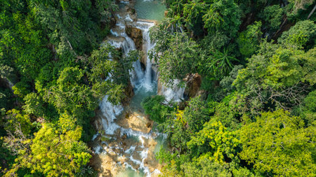 Aerial view of Tat Kuang Si Falls is a stunning, multi-tiered waterfall near Luang Prabang, Laos,...