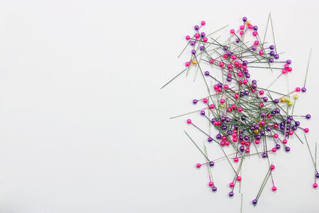 The beauty of the pins on white paper.