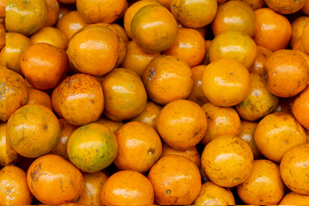Orange fruit in the market. Orange background. Orange background. Orange background