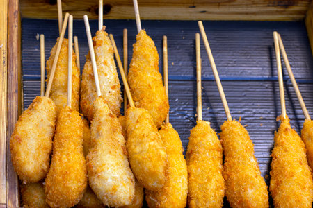 Fried shrimp on wooden stick. Street food. Close up.の写真素材