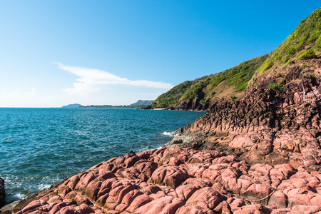 Pink rocky Beach and blue sky.の写真素材
