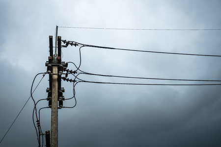 Electricity post before rain.の写真素材