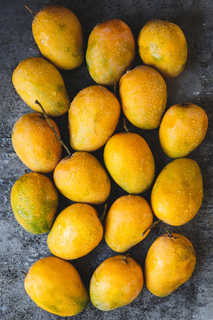 Fresh ripe mangoesの写真素材