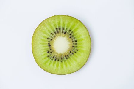 Fresh kiwi slice on the white backgroundの写真素材