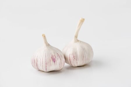 Garlic bulb-Garlic clove on white backgroundの写真素材