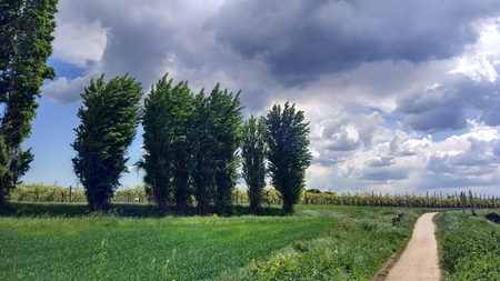 impressive natural landscape from italy with stormy cloudsの写真素材