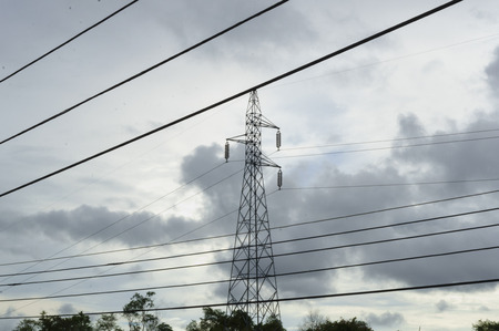 High-voltage lines that deliver electricity from power plants to public houses.