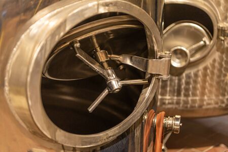 Closeup of a tank door from a tanks to storage for foodの写真素材