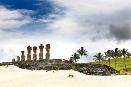 Seven moais standing on the Anakena Beach in Easter Island facing inland  の写真素材