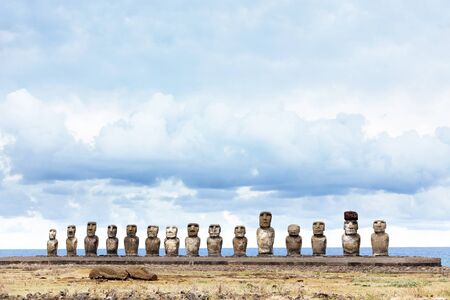 Fifteen moai in Easter Island against blue seaの写真素材