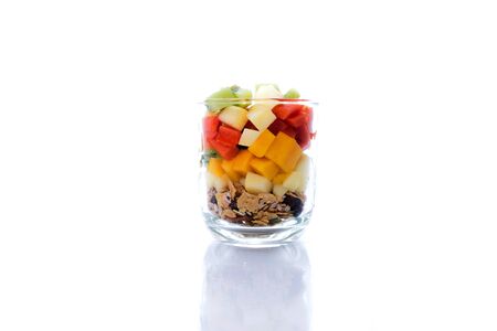 fresh organic fruit salad kiwi, apple, papaya, mango, serialの写真素材