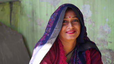 29 December 2020, Reengus Jaipur, India. Well cultured Indian woman with traditional cloths with red...