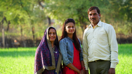 29 December 2020- Badhal, Jaipur, India. Indian family and cute daughter giving a elegant shot in front of Camera. Great Indian family shot with eternal love affection.のeditorial素材