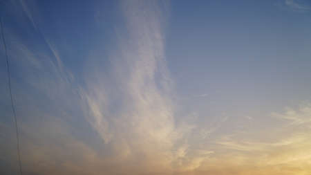 Blue sky with white clouds pattern. White light clouds floating in the blue sky. Wet sky clouds with blue sky nature concept.の写真素材