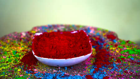 Bowl full of Red Gulal or Abhir color. Abhir colors in bowl for Holi festival use. Herbal holi Gulal with attractive aroma scent.の写真素材