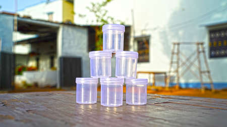Small plastic container for multi things holding. Attractive plastic boxes holding on floor on each upon.の写真素材