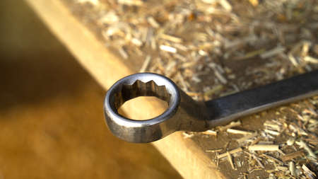 Round spanner one corner closeup. Wrench tools for mechanical purpose.