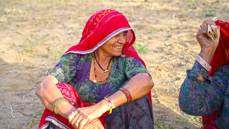 15 April 2021- Reengus, Sikar, India. Traditional senior woman with smiley expression. Aged woman with cheerful smiley face enjoying life.のeditorial素材