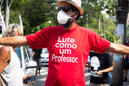 Salvador, Bahia, Brazil - May 29, 2021: Protesters protest against President Jair Bolsonaro's government through the streets of downtown Salvador, Bahia. Everyone wants his exit from the government.のeditorial素材