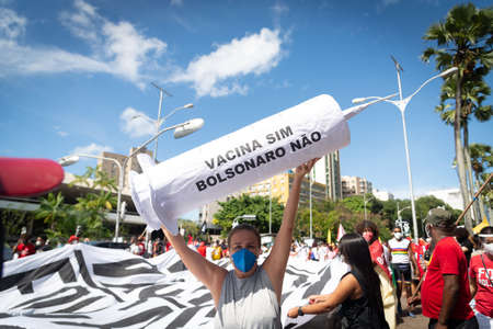 Salvador, Bahia, Brazil - May 29, 2021: Protesters protest against President Jair Bolsonaro's government through the streets of downtown Salvador, Bahia. Everyone wants his exit from the government.のeditorial素材