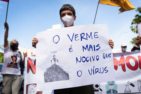 Salvador, Bahia, Brazil - May 29, 2021: Protesters protest against President Jair Bolsonaro's government through the streets of downtown Salvador, Bahia. Everyone wants his exit from the government.のeditorial素材