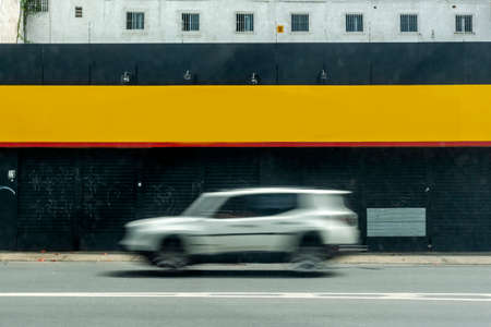 Car speeding along the street of Salvador. Bahia Brazil.の写真素材