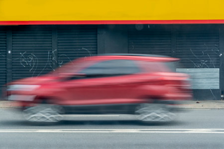 Car speeding along the street of Salvador. Bahia Brazil.の写真素材