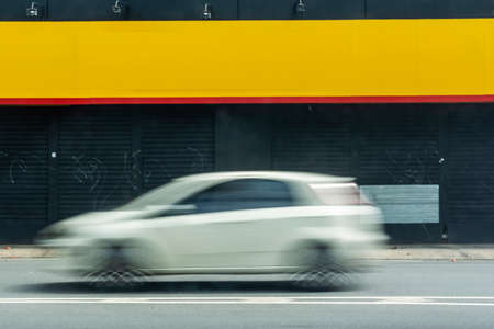 Car speeding along the street of Salvador. Bahia Brazil.の写真素材