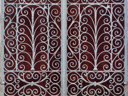 Antique door details in color with shadow, iron, cement, wood.Pelourinho, Salvador, Bahia, Brazil.の写真素材