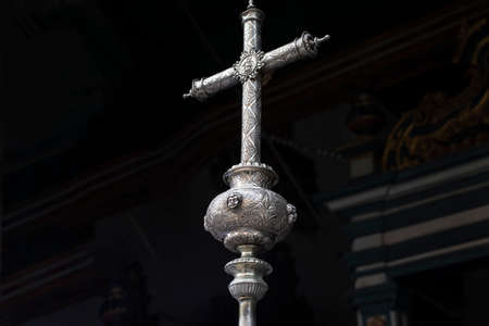 Silver cross entering the church to be worshiped by the faithful. Salvador Bahia Brazil.のeditorial素材