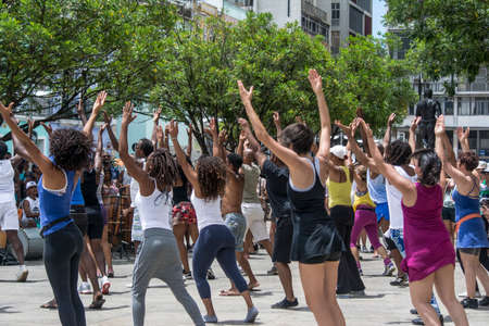 Salvador, Bahia, Brazil - December 31, 2015: Group of dancers dancing in the outdoor city square.のeditorial素材
