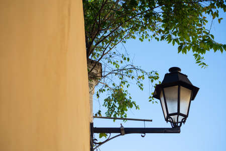 Old lamp to light the streets of Pelourinho. Historic center of Salvador, Bahia, Brazil.の写真素材