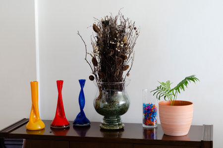 Interior decoration objects of a residential apartment. Various transparent glass objects.