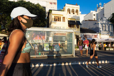 Salvador, Bahia, Brazil - June 17, 2021: People walking on the streets of Barra neighborhood in the late afternoon in Salvador, Bahia.のeditorial素材