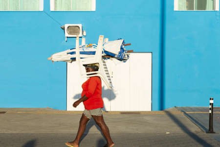 Salvador, Bahia, Brazil - June 17, 2021: People walking on the streets of Barra neighborhood in the late afternoon in Salvador, Bahia.のeditorial素材