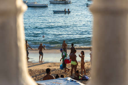 Salvador, Bahia, Brazil - June 17, 2021: People playing sand football on the beach at Porto da Barra in Salvador, Bahia.のeditorial素材
