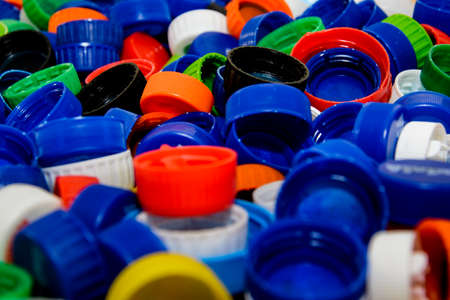 Various plastic bottle caps, circular and in different colors. Salvador, Bahia, Brazil.の写真素材