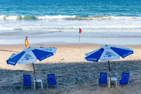 Salvador, Bahia, Brazil - June 17, 2021. People at Farol da Barra beach in full pandemic to remove stress caused by coronavirus.のeditorial素材