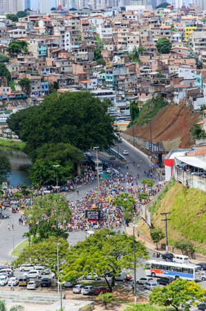 Salvador, Bahia, Brazil - July 20, 2014: Popular party with many people behind a sound car at Dique do Tororo in Salvador, Bahia.のeditorial素材