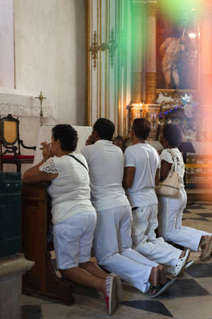 Salvador, Bahia, Brazil - December 28, 2018: Faithful celebrates the last Friday of the year at Senhor do Bonfim Church.のeditorial素材