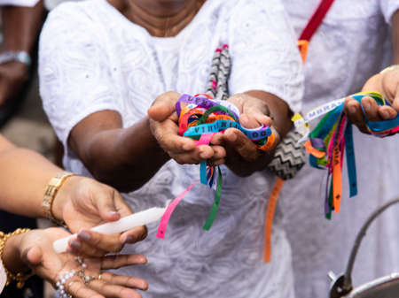 Salvador, Bahia, Brazil - December 28, 2018: Faithful celebrates the last Friday of the year at Senhor do Bonfim Church.のeditorial素材