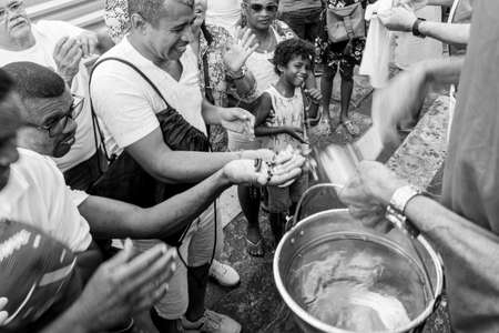 Salvador, Bahia, Brazil - December 28, 2018: Faithful celebrates the last Friday of the year at Senhor do Bonfim Church.のeditorial素材