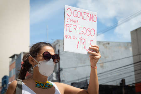 Salvador, Bahia, Brazil - May 29, 2021: Protesters protest against the government of President Jair Bolsonaro in the city of Salvador.のeditorial素材