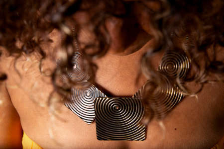 Afro-Brazilian model in portrait with eyes closed photographed in studio with black background. Concept of awareness, maturity and femininity. Salvador Bahia Brazil.の写真素材