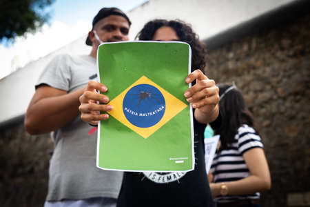 Salvador, Bahia, Brazil - June 19, 2021: Protesters protest against the government of President Jair Bolsonaro in the city of Salvador.のeditorial素材