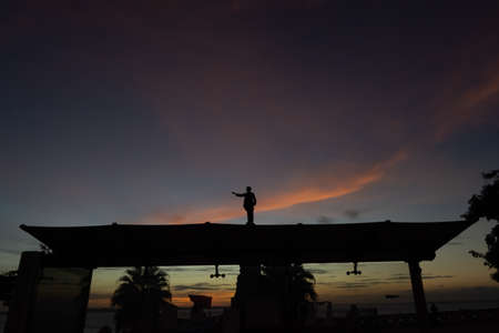 Savior; Bahia; Brazil - June 11, 2021: Silhouette of the statue of Poet dos Escravos; Castro Alves in the square that bears his name in Salvador; Bahia.のeditorial素材